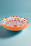 A colorful zigzag pattern salad bowl.