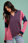 Split neck oversized sweater berry and navy stripes and color block details. Raw hem details throughout, cozy and casual fit. 