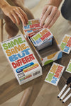 An image of the game Same Same But Different. Includes 350 cards, dry erase cards & markers, and instructions. For 17 years+.