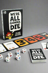 Image of the game We’re all Gonna Die- a die rolling game for 16 years and up.