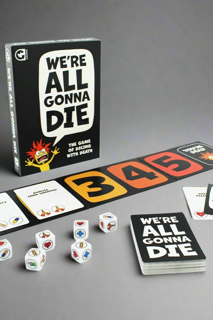 Image of the game We’re all Gonna Die- a die rolling game for 16 years and up.