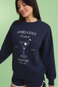 This is a graphic print navy crewneck sweatshirt. It is long sleeved and medium weight.