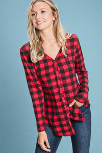 A women’s buttery soft red and black buffalo plaid print long sleeve button front shirt with v-neckline.