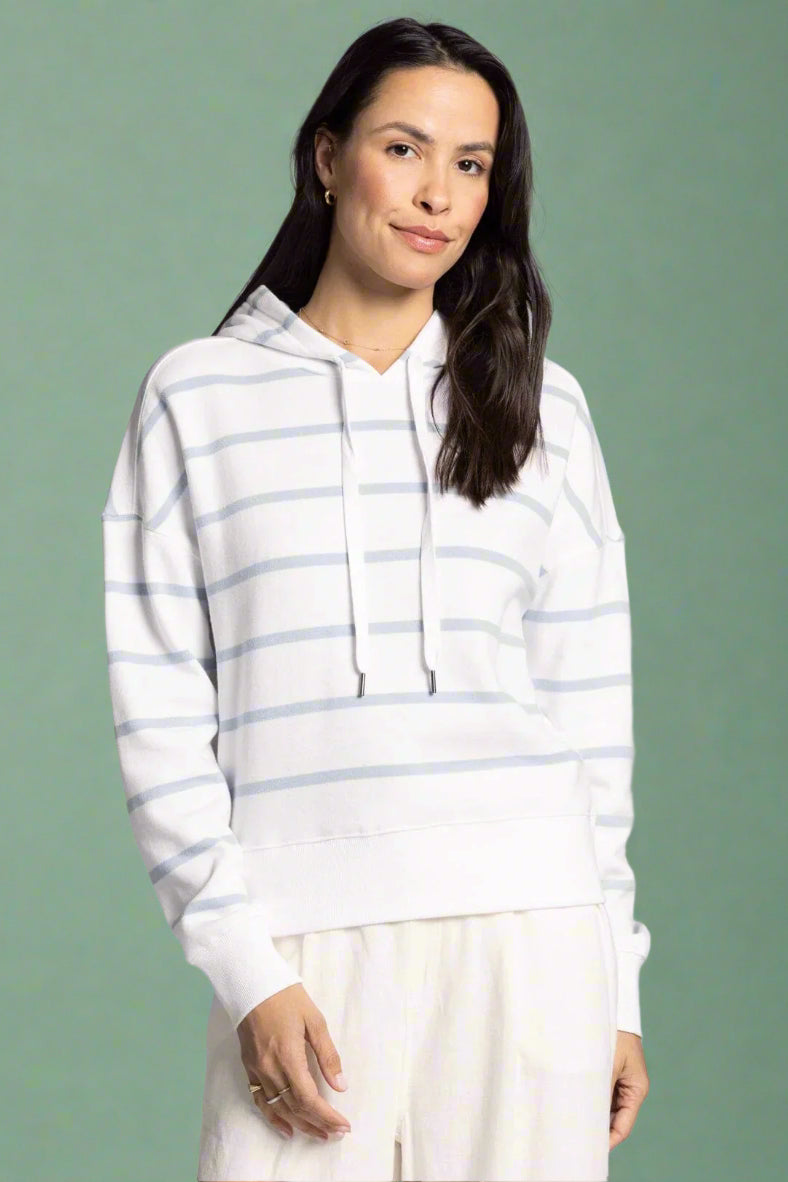 Model is wearing a white and light blue classic striped hoodie. 