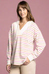 Model is wearing a colorful striped hoodie featuring a deep v neckline and dolphin hem.