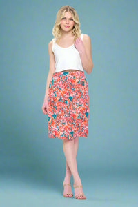 Model is wearing a watercolor inspired floral printed pencil skirt with pockets.