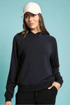 A women’s classic lightweight hooded sweatshirt in buttery soft black material.