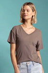 A women’s basic short sleeve t-shirt featuring v-neckline and 100% cotton material in a light mocha color.