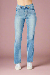 A pair of classic women’s high-waisted straight leg jeans in a light blue wash by Judy Blue.