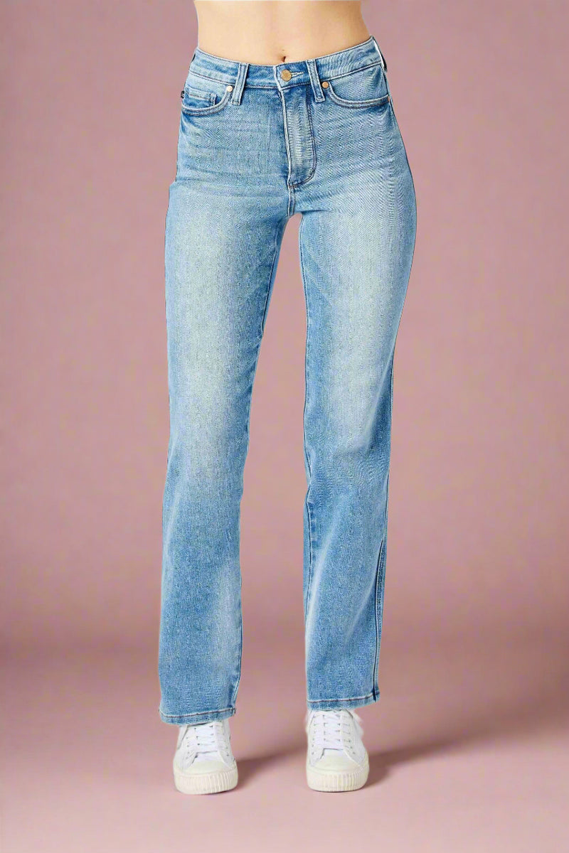 A pair of classic women’s high-waisted straight leg jeans in a light blue wash by Judy Blue.
