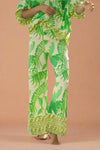 These long palm print Jax pants has a side zip enclosure and elastic back.