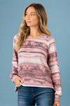 A women’s lightweight tie dyed long sleeve top in mauve featuring an open crisscross back and boat neckline.