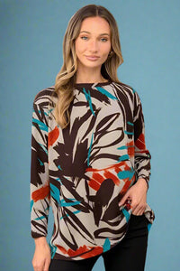 A long sleeve crew neck top with a brown, teal, and ivory abstract pattern. It is a loose fit top made of light material.