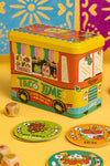 An image of the game Taco Time. Includes 32 Food Cards, 12 Drink Cards, and 8 Ingredient Dice. For 2-6 players and ages 8 years and up.