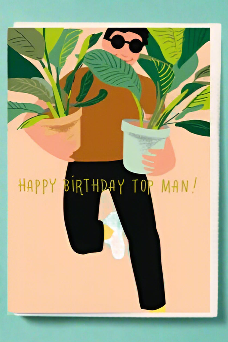 A greeting card with the image of a man holding two potted plants and text that reads ‘Happy Birthday Top Man!’