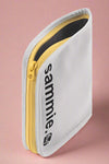 An image of a white, black and yellow reusable sandwich bag. It has a zip closure and made from organic, recycled, BPA free materials.