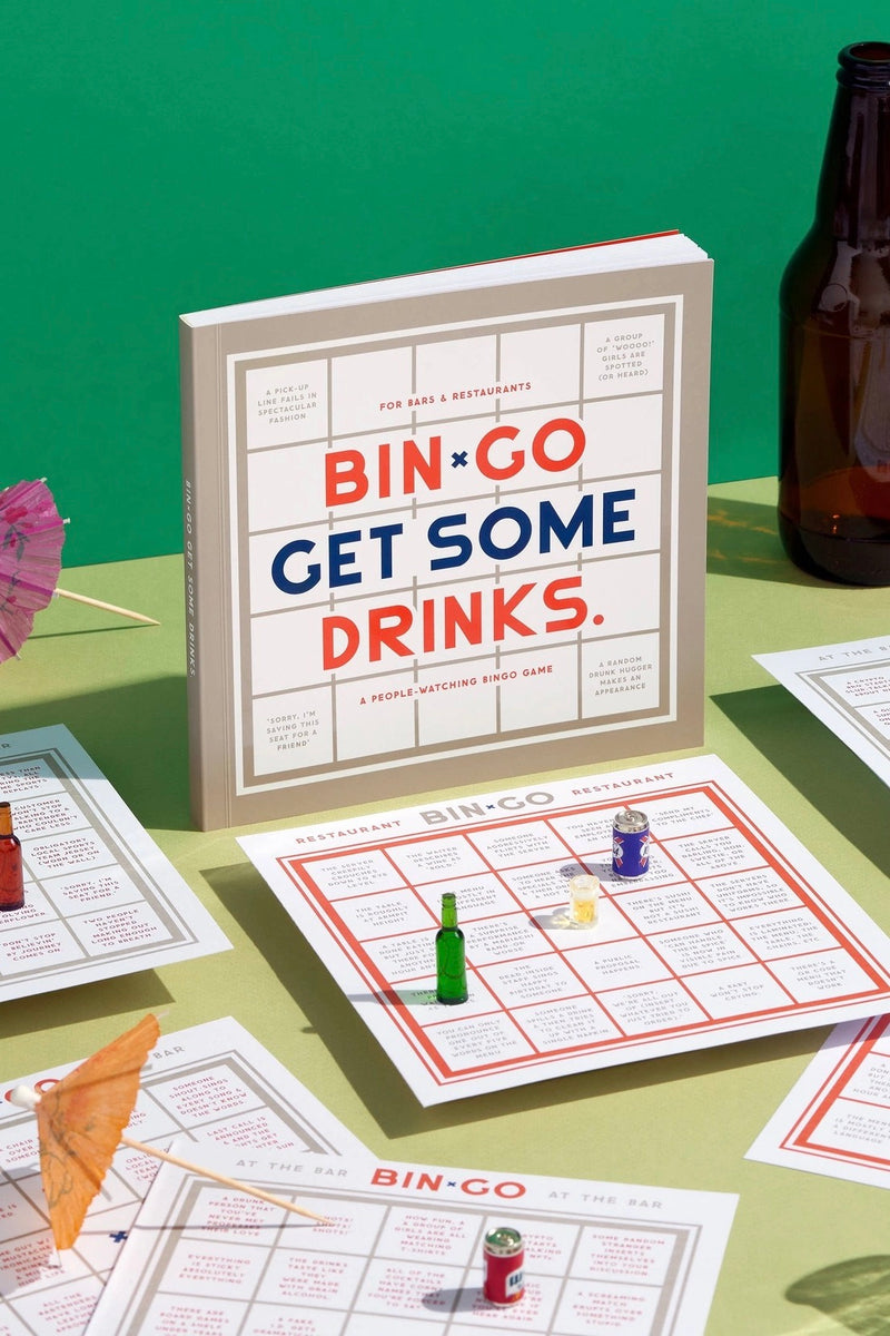 An image of the cover and inside bingo boards of the game book called Bingo Get Some Drinks.