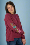 Floral Embroidered Sleeve Mineral Wash Knit Top Wine