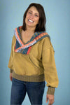 A women’s hooded sweatshirt in a camel color with contrasting knit hood and neckline.