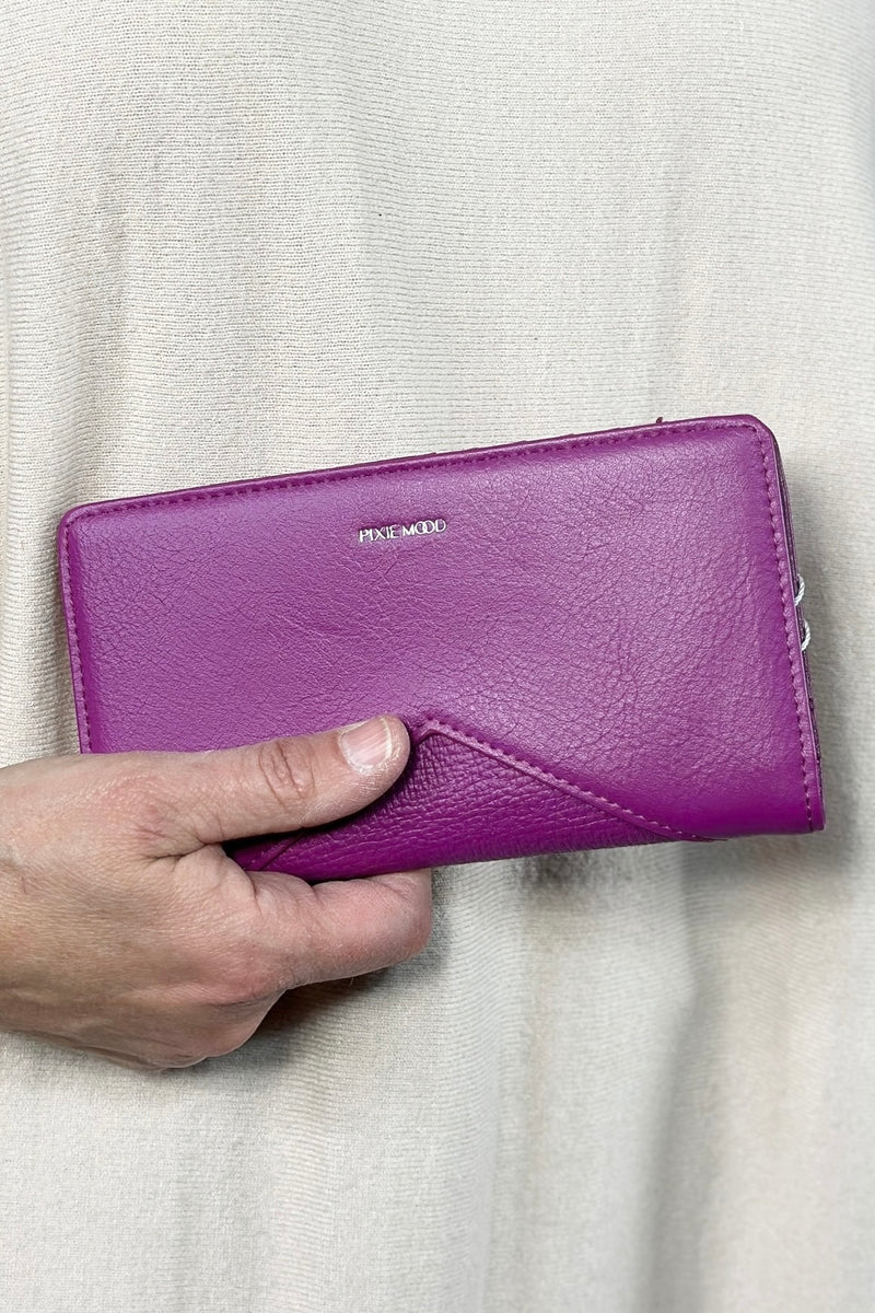 Sophie card wallet snap closure faux leather, sturdy, purple, lots of room.