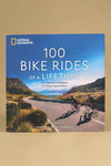 The cover of 100 Bike Rides of a Lifetime by Roff Smith. It is a National Geographic book.