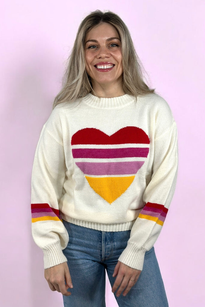 Color Block Heart detail sweater featuring a crew neck with ribbed hem and cuffs