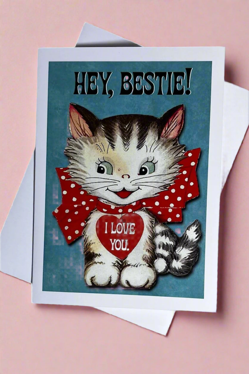 A card with an image of a cat that says “hey, bestie! I love you.”