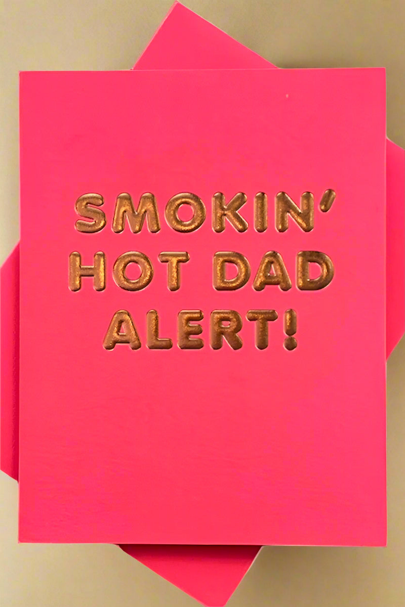 A solid hot pink greeting card with copper bubble text that reads “Smokin’ Hot Dad Alert!’