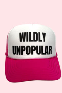 Hot pink and white trucker hat with black lettering that reads "Wildly Unpopular."