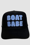 Black trucker hat with Boat Babe written on front in blue bubble letters.