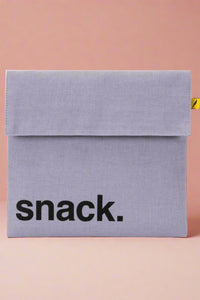 A reusable, Velcro closure snack bag in the color lavender.