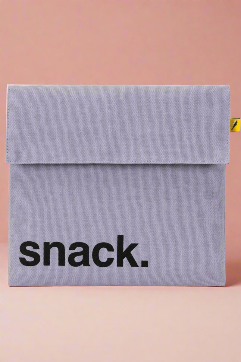 A reusable, Velcro closure snack bag in the color lavender.