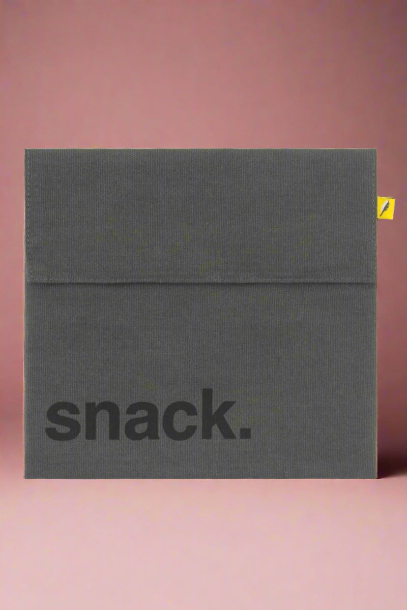 A reusable, Velcro close snack bag in the color dusk.