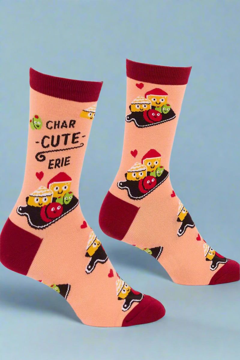 Pair of socks with cartoon train design and text on a white background