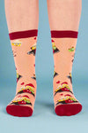 Socks with pizza and taco designs on a white background