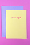 A minimalist greeting card in pale yellow with pink text that reads ‘You’ve aged.”