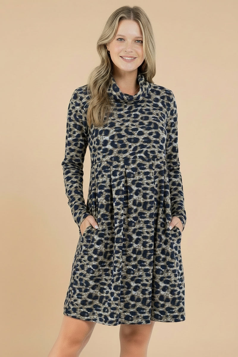 Woman wearing a leopard print dress against a white background