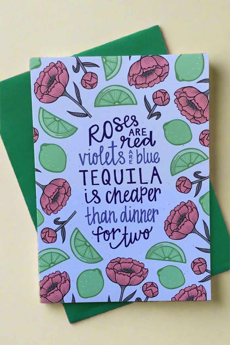 Card with flowers and lime wedges with the words “ Roses are red violets are blue, tequila is cheaper than dinner for two.”