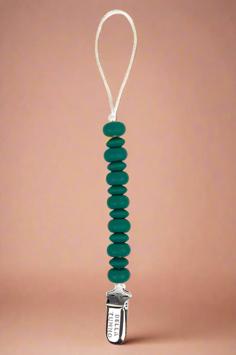 A beaded silicone Teether in green that is also a pacifier clip.