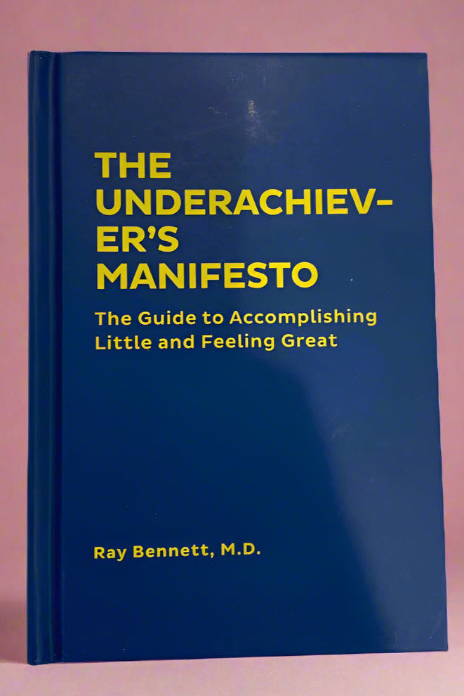 Cover of The Underachiever's Manifesto, the guide to accomplishing little and feeling great.