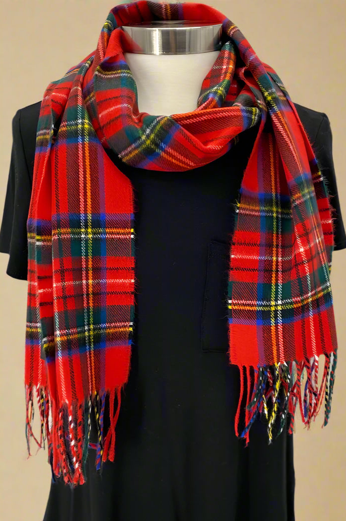 A super soft, classic, red plaid scarf with fringe.