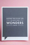 A card with blue text box that says “Having you in my life has really done wonders for me.“