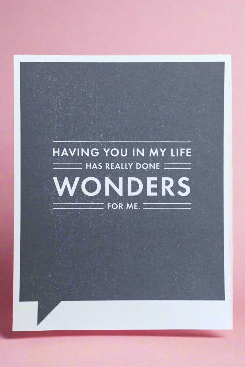 A card with blue text box that says “Having you in my life has really done wonders for me.“