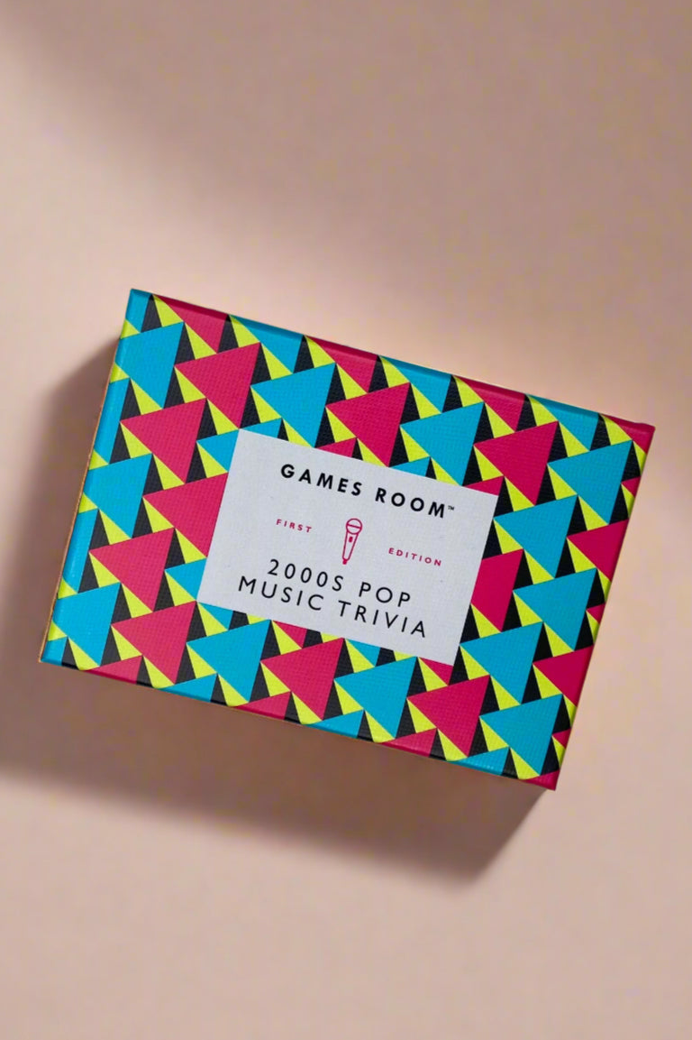 A box of trivia cards about 2000s pop music.