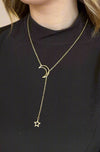 A moon and star long lariat necklace.