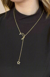 A moon and star long lariat necklace.