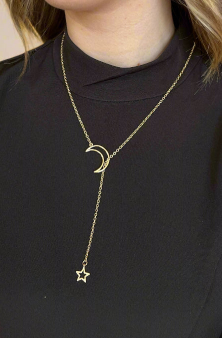 A moon and star long lariat necklace.