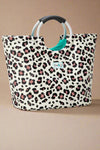 A leopard print water resistant tote with curved handles.
