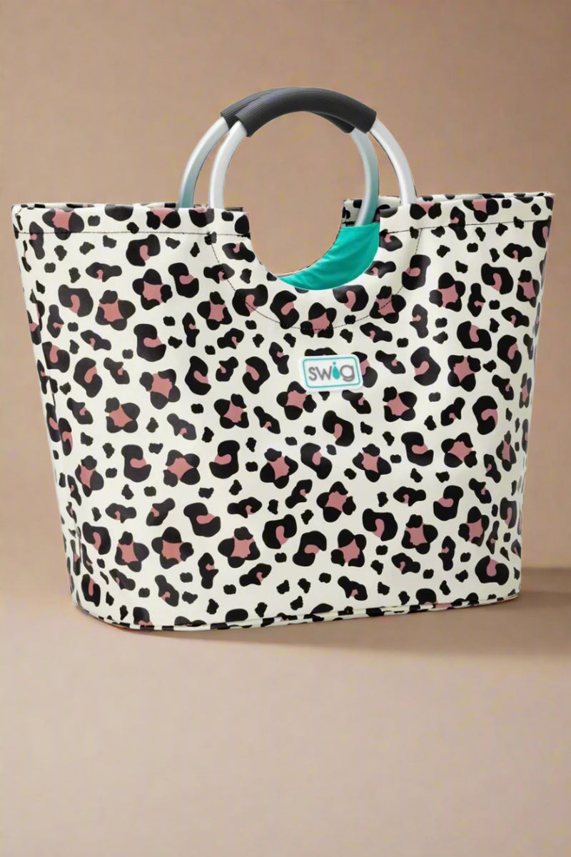 A leopard print water resistant tote with curved handles.