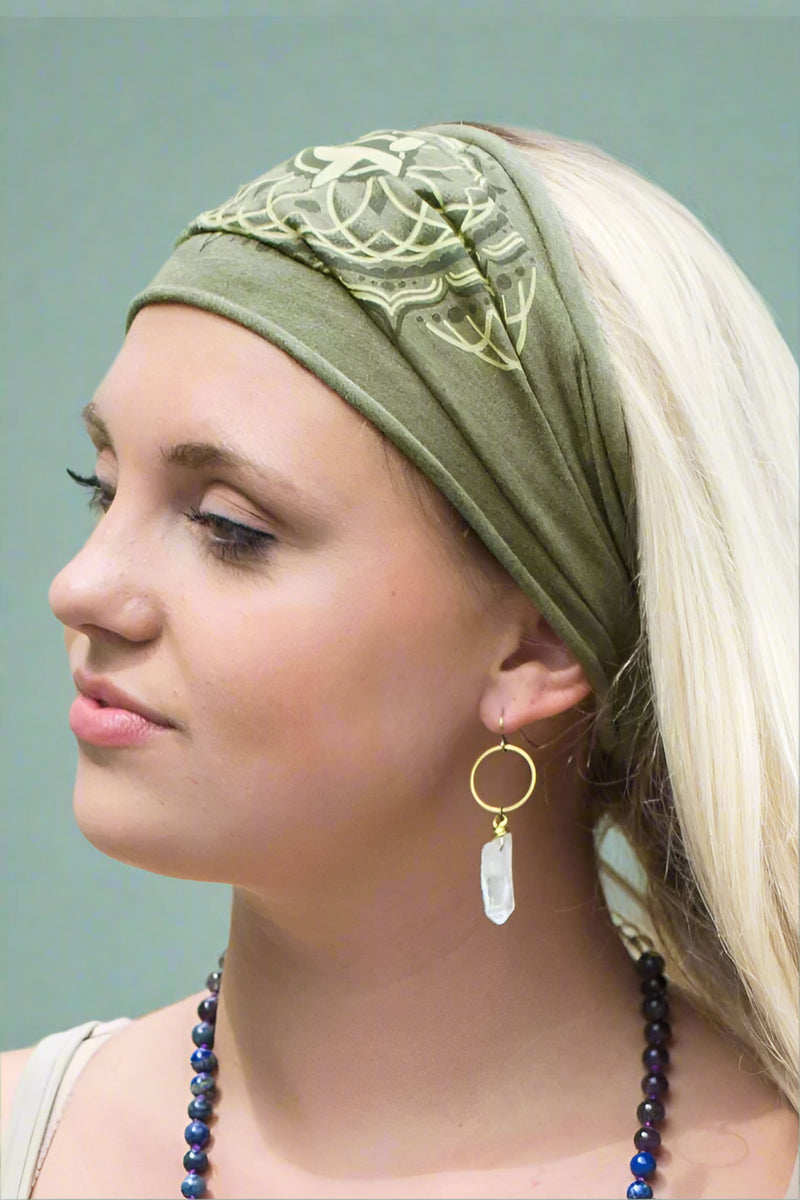 Heathered green headband featuring a unique light green print of the fourth chakra.